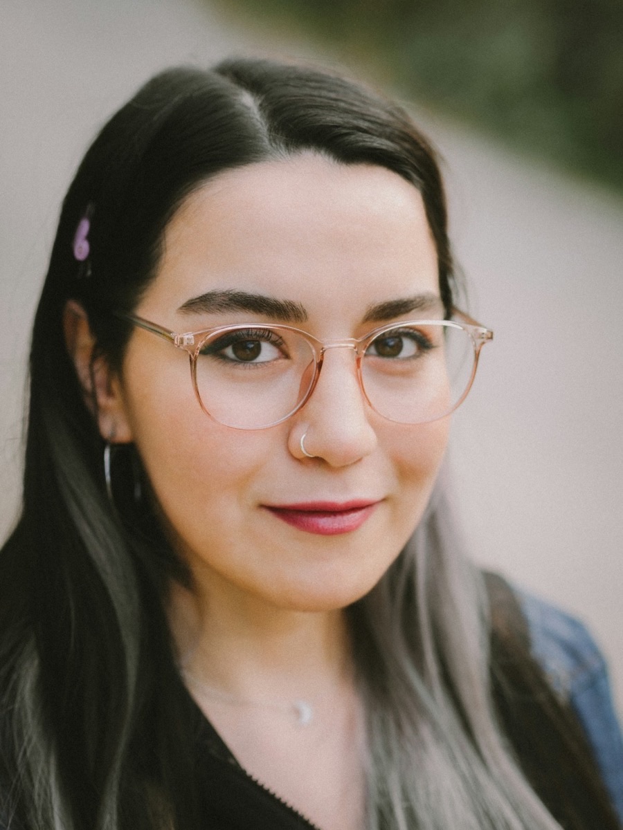 Portrait of the person named alongside, against a plain background.